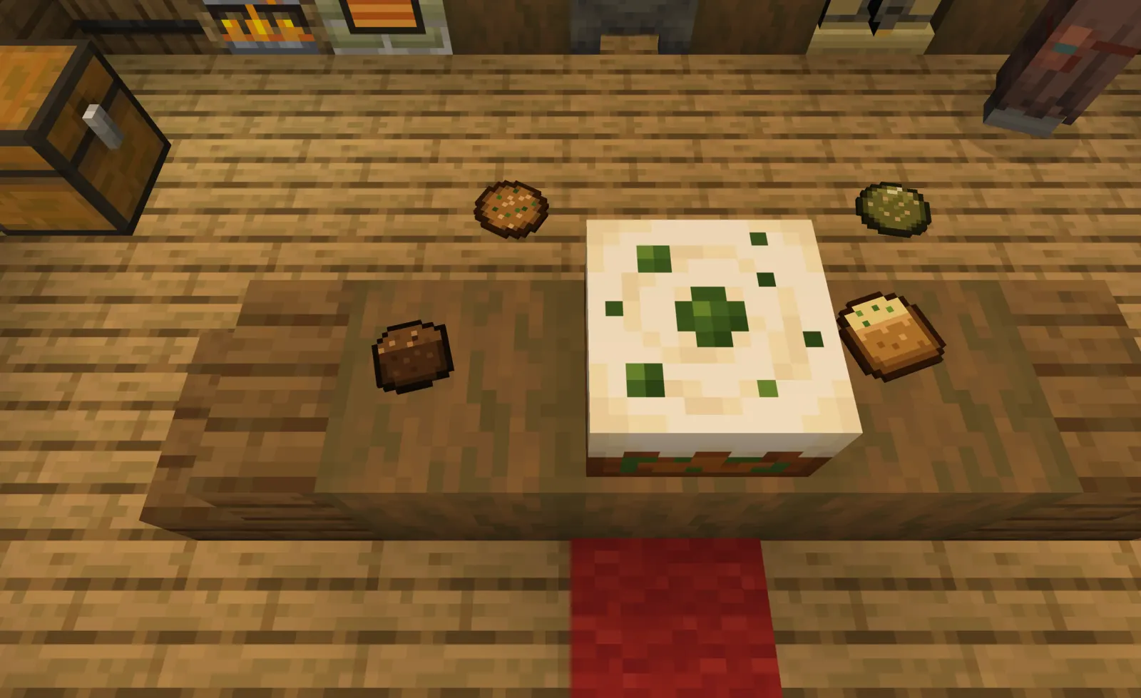 Top-down view of a kitchen table with a space cake, a brownie, a space cookie and cannabutter toast.